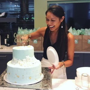 Connie cuts cake at the anniversary celebration